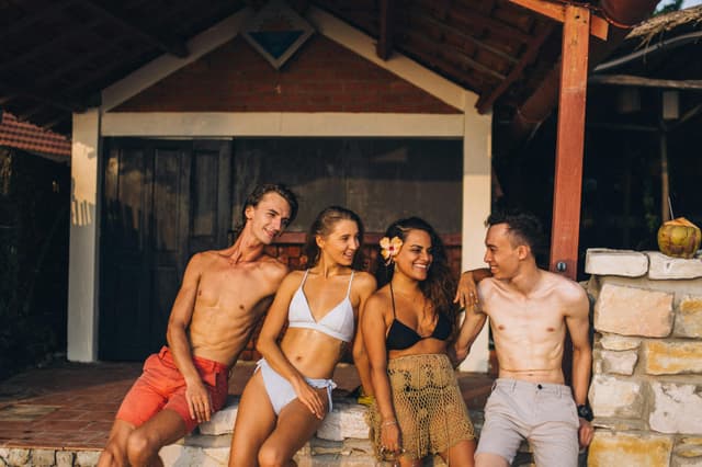 Friends hanging out on the beach